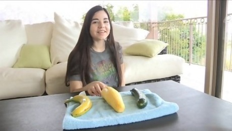 Naughty chick pleasures her pussy with a banana and a cucumber